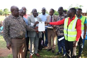 Official-Handover-of-land-documents-useep